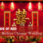 A beautifully decorated modern Chinese wedding setup featuring a mix of traditional red and contemporary pastel tones, with elegant floral arrangements and symbolic decor elements.