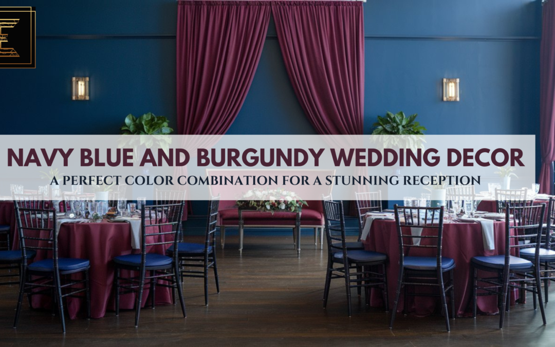 Navy blue and burgundy wedding reception decor with elegant table settings and drapery.