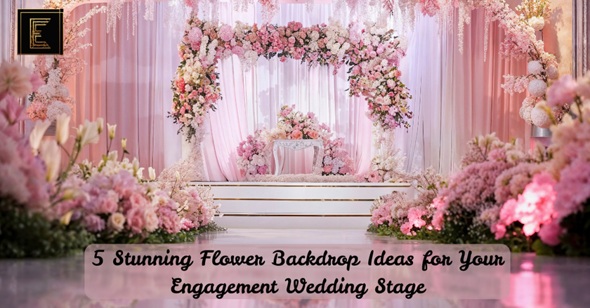 Beautiful engagement stage with a lavish floral backdrop, featuring pastel blooms, cascading drapes, and ambient lighting for a romantic wedding setting.