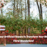Elegant outdoor wedding setup with UV resistant artificial flowers lining the aisle and large outdoor artificial flowers in pots creating a romantic ceremony backdrop under clear skies