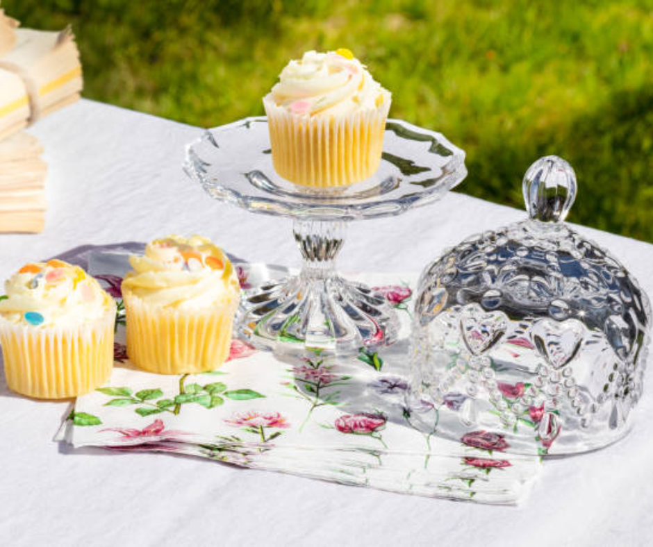 Crystal chandelier wedding décor with soft lighting and flowers creating a glamorous ambiance.