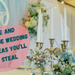 A dreamy wedding backdrop with cascading dusty rose floral arrangements and flowing dusty blue fabric panels.