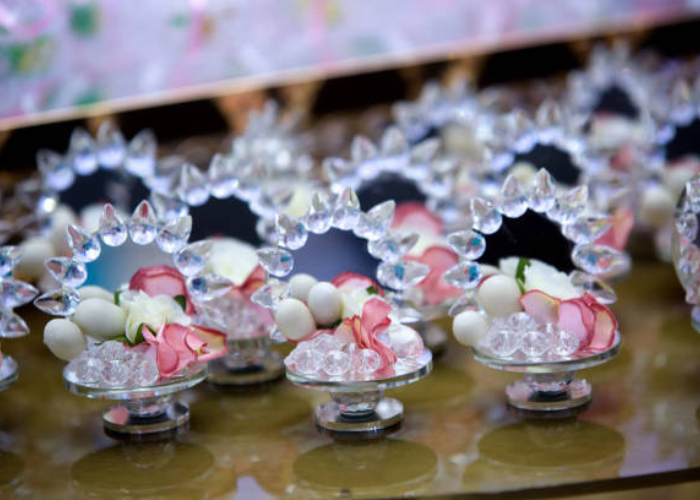 Small crystals scattered on a wedding table creating subtle sparkle and luxury in table settings.